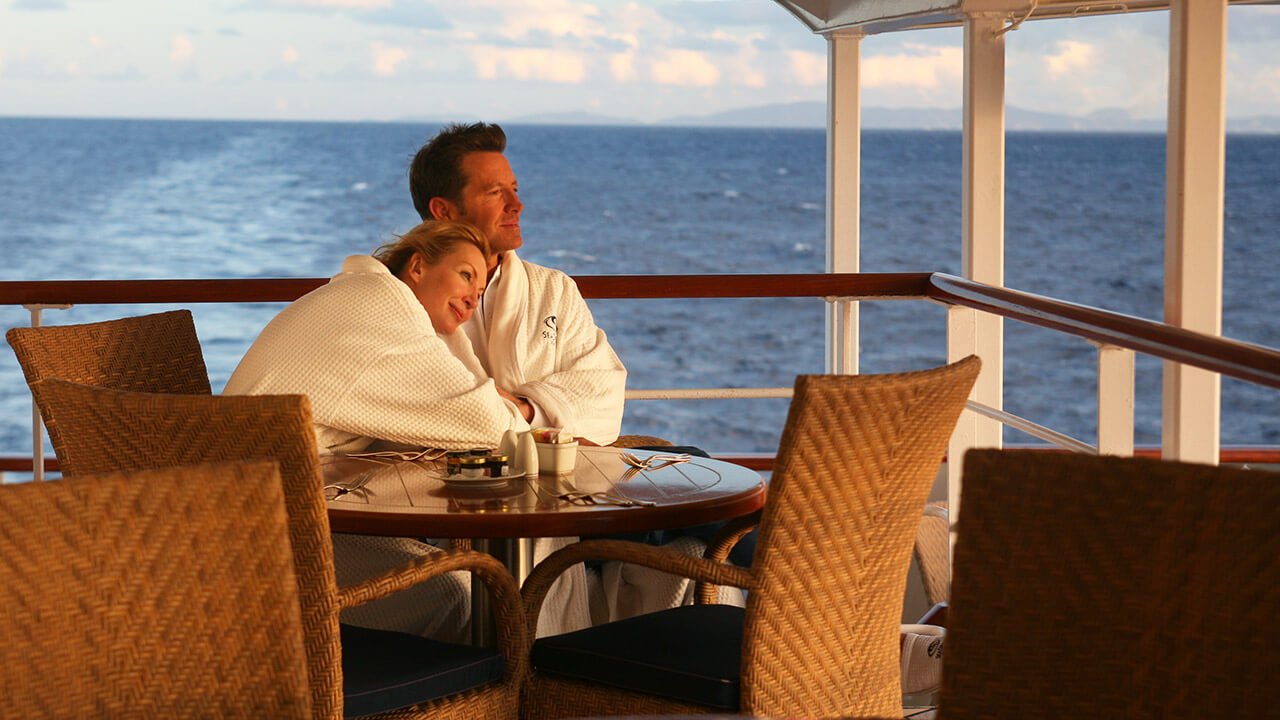 Couple relaxing onboard SeaDream